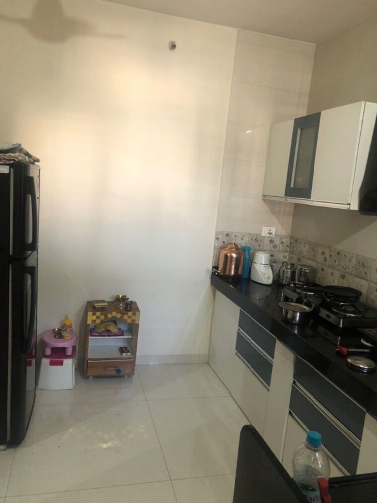 Kitchen, darode-q-homes 2 Bedroom 950 Sq.Ft. Apartment In Kharadi Pune 10501107