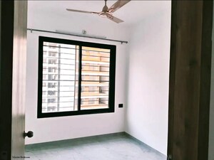 Bedroom in 2 BHK Apartment at Unique Youtopia, Kharadi – for Rent