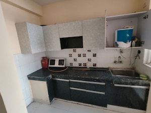 Kitchen in 3 BHK Apartment at High End Paradise II, Raj Nagar Extension – for Sale