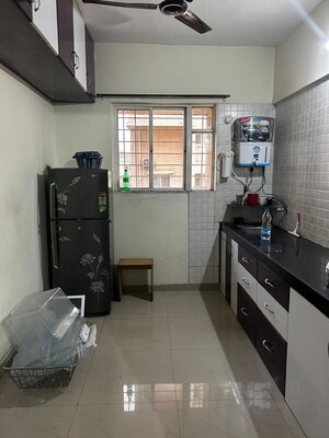 Kitchen in 2 BHK Apartment at Essen Shonest Towers, Wakad – for Rent