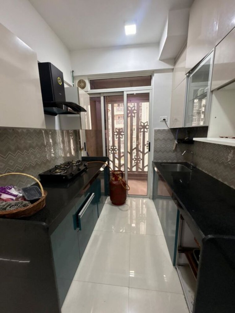 Kitchen, lodha-codename-premier 2.5 Bedroom 759 Sq.Ft. Apartment In Dombivli East Thane 10501219