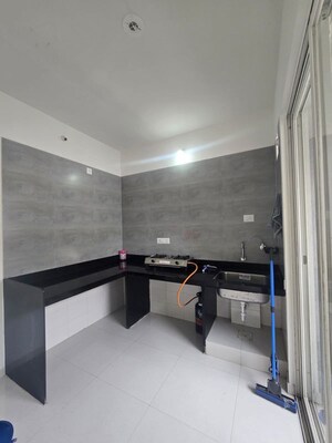 Kitchen in 2 BHK Apartment at Rama Fusion Towers Phase 2, Hinjewadi – for Rent