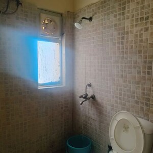 Bathroom in 2 BHK Apartment at Paras Tierea, Sector 137 – for Sale
