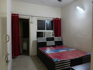 Bedroom in 1 BHK Apartment at Kamgar Putala Vasahat – for Rent