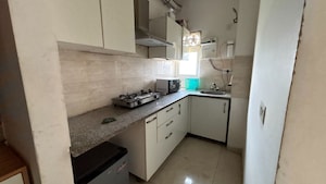 Kitchen in 1 BHK Apartment at Ajnara Daffodil, Sector 137 – for Rent