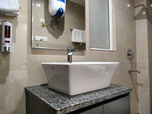 Bathroom in 4 BHK Builder Floor at Sushant Lok Iii – for Rent