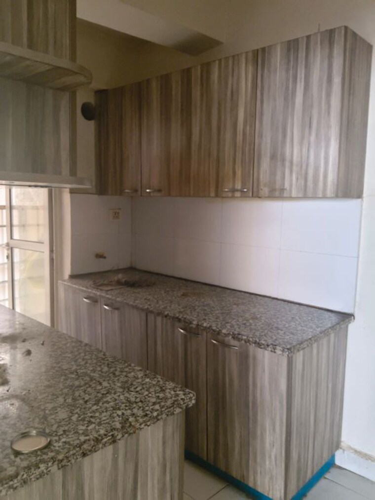Kitchen, paras-tierea 3 Bedroom 1330 Sq.Ft. Apartment In Sector 137 Noida 10501404