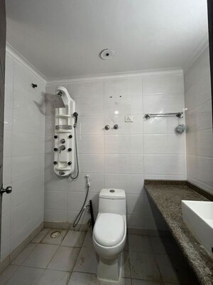 Bathroom in 4 BHK Apartment at Mahagun Moderne, Sector 78 – for Rent