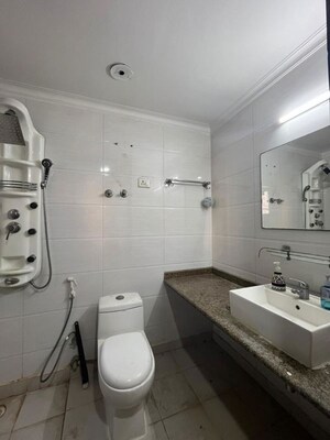 Bathroom in 4 BHK Apartment at Mahagun Moderne, Sector 78 – for Rent