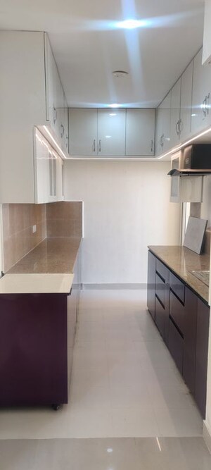 Kitchen in 3 BHK Apartment at Pardos Okas Residency, Sushant Golf City – for Rent