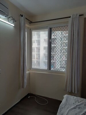 Room in 1 BHK Apartment at Sikka Karmic Greens, Sector 78 – for Rent