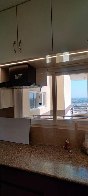 Kitchen in 3 BHK Apartment at Pardos Okas Residency, Sushant Golf City – for Rent