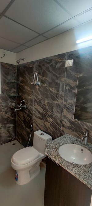 Bathroom in 3 BHK Apartment at Pardos Okas Residency, Sushant Golf City – for Rent