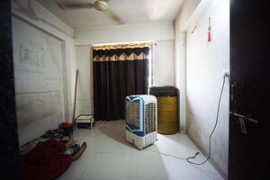 Living Room in 2 BHK Apartment at Ramol – for Sale