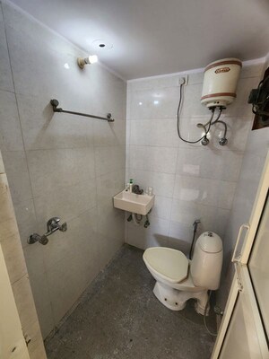 Bathroom in 1 BHK Builder Floor at Dlf Phase ii – for Rent