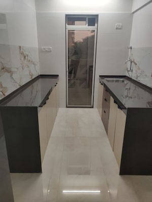 Kitchen in 1 BHK Apartment at Radheya Sai Enclave, Naigaon East – for Sale