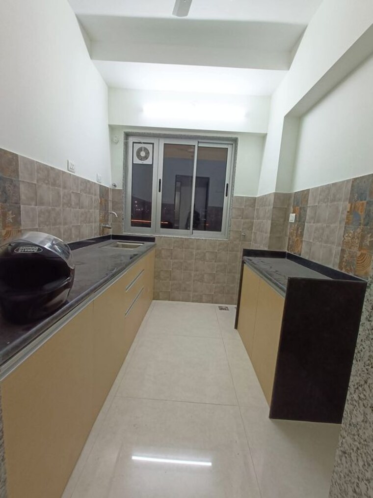 Kitchen, naman-premier 2 Bedroom 669 Sq.Ft. Apartment In Andheri East Mumbai 10501663