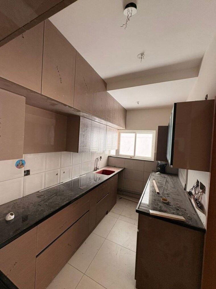 Kitchen, brigade-caladium 4 Bedroom 4200 Sq.Ft. Apartment In Hebbal Bangalore 10501702