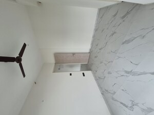 Bathroom in 2 BHK Apartment at Ruparel Sky Green, Kandivali West – for Rent