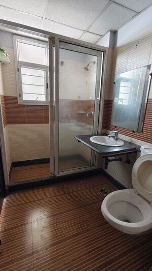 Bathroom in 2 BHK Apartment at Prateek Grand City, Siddharth Vihar – for Rent