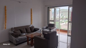 Living Room in 2 BHK Apartment at Kohinoor Sportsville, Hinjewadi – for Rent
