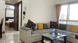 Living Room in 2 BHK Apartment at Lodha Amara, Kolshet Road – for Rent