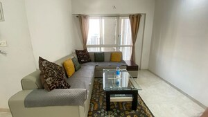 Living Room in 2 BHK Apartment at Lodha Amara, Kolshet Road – for Rent