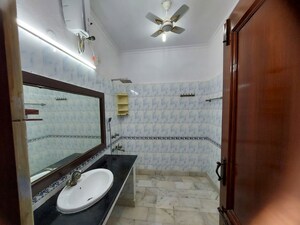 Bathroom in 1.5 BHK Builder Floor at Indraprastha Colony – for Rent