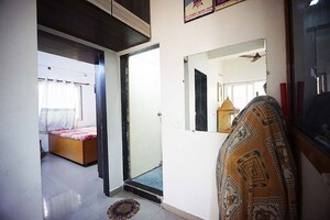 Living Room in 2 BHK Apartment at Nava Naroda – for Sale
