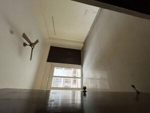 Staircase in 2.5 BHK Apartment at Mahagun Moderne, Sector 78 – for Rent