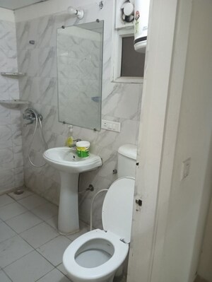 Bathroom in 4 BHK Apartment at Gaur Yamuna City 16th Park View, Gaur Yamuna City – for Rent
