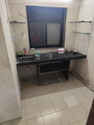 Kitchen in 2 BHK Apartment at Jai mahakali CHS, Andheri East – for Rent