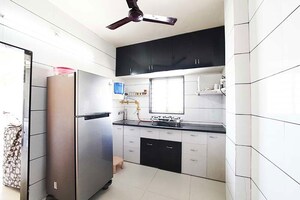 Kitchen in 2 BHK Apartment at Ghatlodia – for Sale