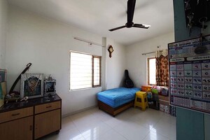 Living Room in 2 BHK Apartment at Ghatlodia – for Sale