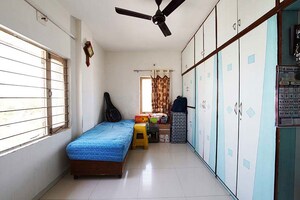 Living Room in 2 BHK Apartment at Ghatlodia – for Sale