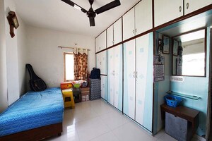 Living Room in 2 BHK Apartment at Ghatlodia – for Sale