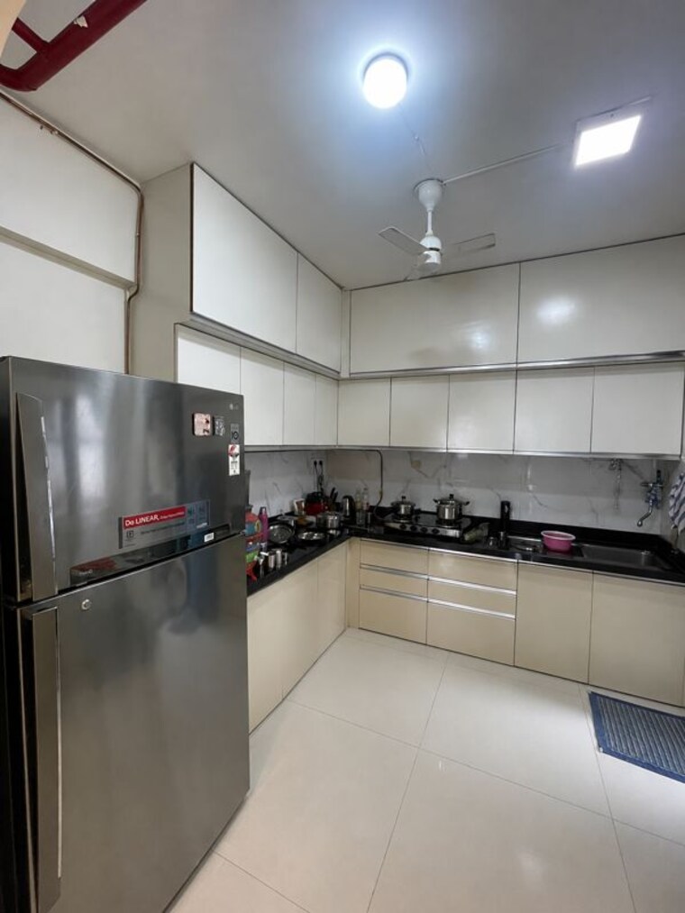 Kitchen, bhojwani-skyscraper 2.5 Bedroom 970 Sq.Ft. Apartment In Tathawade Pune 10502088