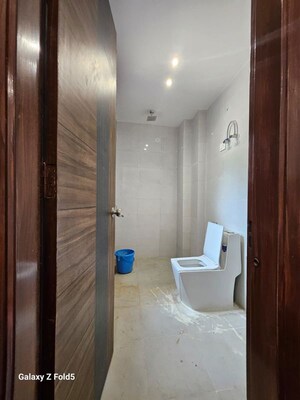 Bathroom in 1 BHK Builder Floor at Freedom Fighters Enclave – for Rent