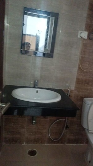 Bathroom in 3 BHK Apartment at Nimbus The Hyde park, Sector 78 – for Rent