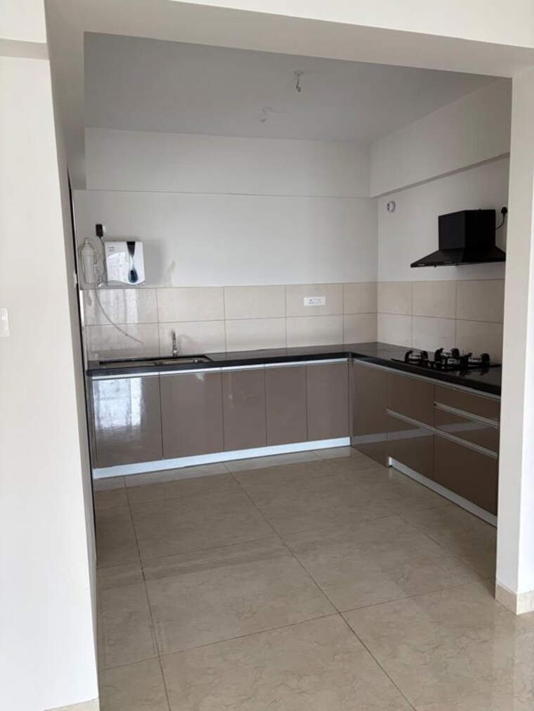 Kitchen, gera-world-of-joy 2 Bedroom 806 Sq.Ft. Apartment In Kharadi Pune 10502173