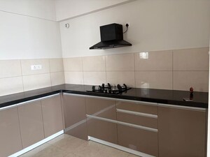 Kitchen in 2 BHK Apartment at Gera World of Joy, Kharadi – for Sale