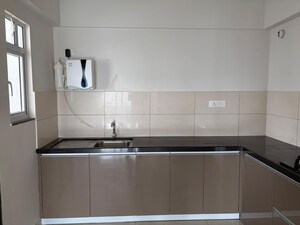 Kitchen in 2 BHK Apartment at Gera World of Joy, Kharadi – for Sale
