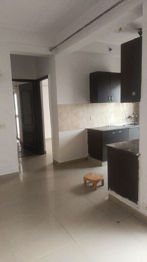 Kitchen in 2 BHK Apartment at Amrapali Silicon City, Sector 76 – for Rent