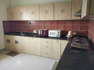 Kitchen in 2 BHK Apartment at Indus Cityscapes Anantya, Navallur – for Rent
