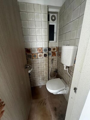 Bathroom in 1 BHK Apartment at Sai Darashan CHS, Andheri East – for Rent