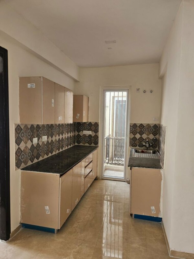 Kitchen, signature-global-park-4-and-5 3 Bedroom 1120 Sq.Ft. Apartment In Sohna Sector 36 Gurgaon 10502241