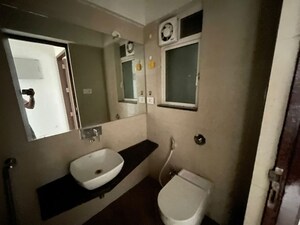 Bathroom in 2 BHK Apartment at Omkar Meridia, Kurla West – for Rent