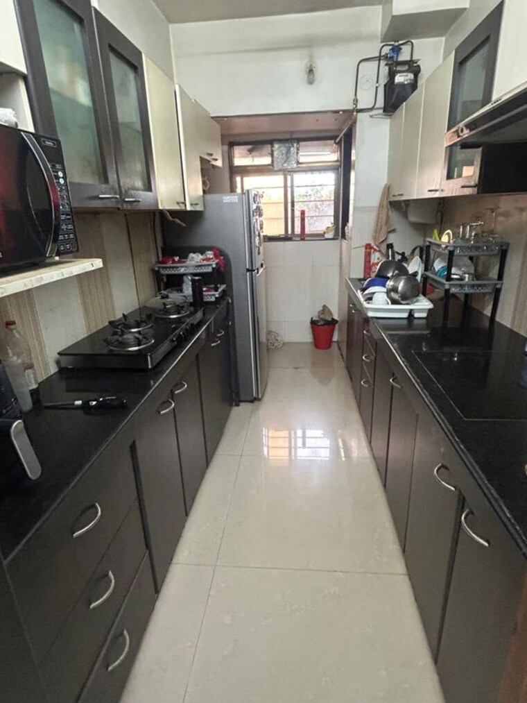 Kitchen, ajmera-bhakti-park-sector-i-and-ii 2 Bedroom 710 Sq.Ft. Apartment In Bhakti Park Mumbai 10502250