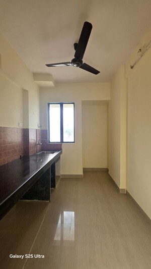 Kitchen in 1 BHK Apartment at Kavya Hill View CHS, Anand Nagar – for Sale