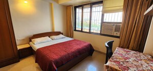 Bedroom in 2 BHK Apartment at Ajmera Bhakti Park Sector I and II, Bhakti Park – for Rent